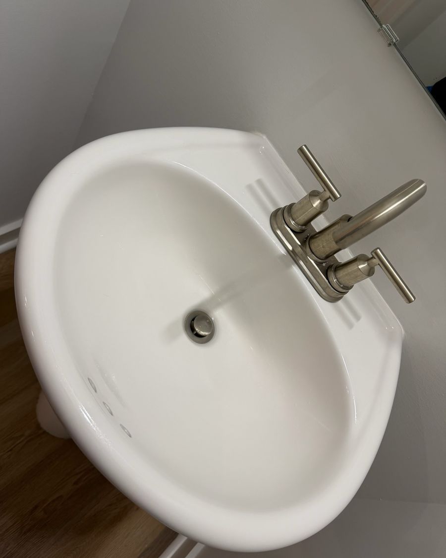 Clean bathroom sink and faucet